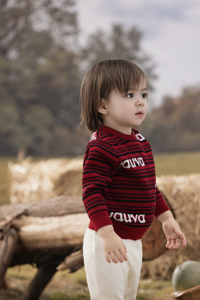 Vauva FW23 - Baby Boys Red and Black Striped Cotton Pullover model side