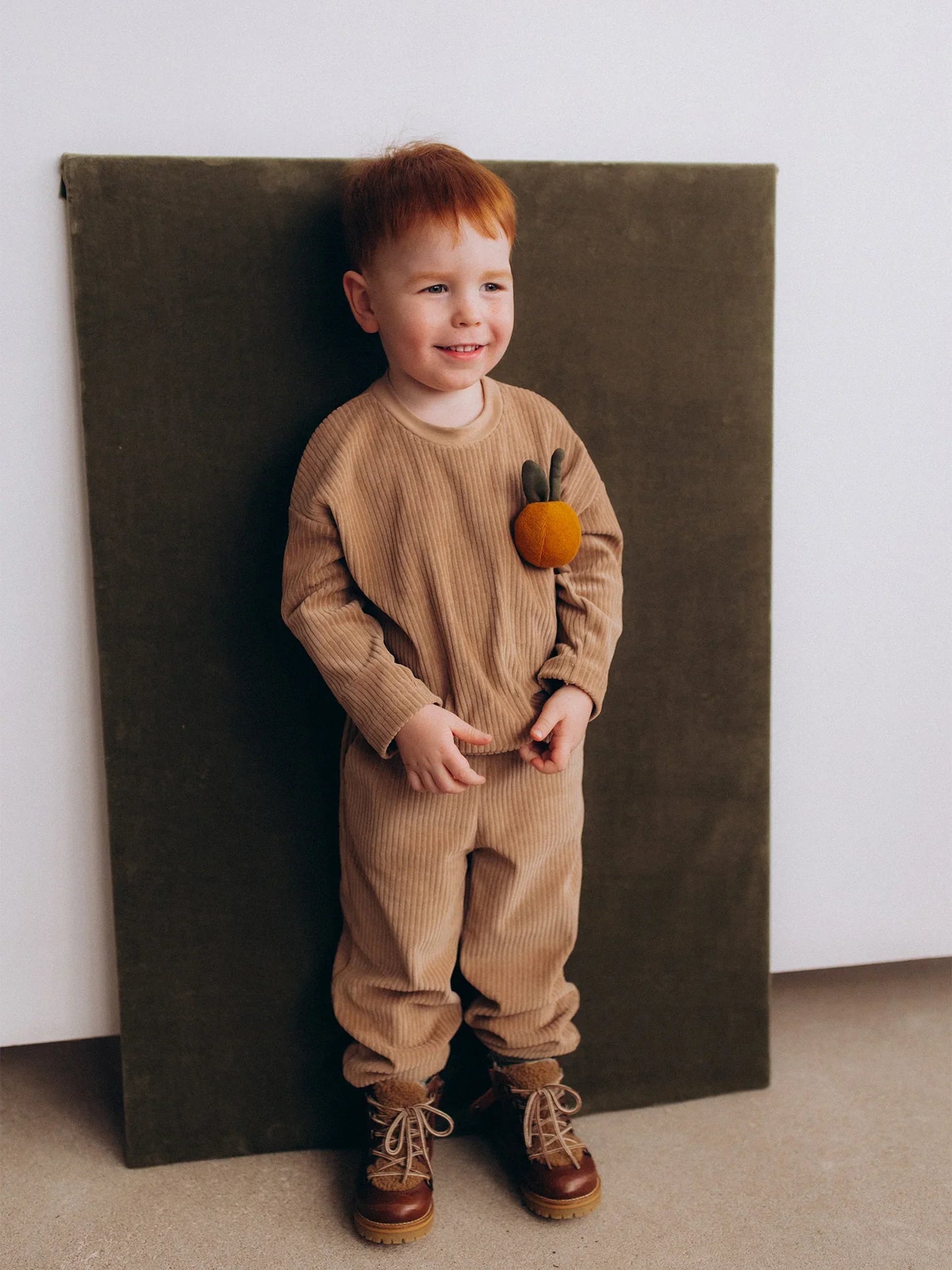 Cord Velour Sweater With Fruit Toy