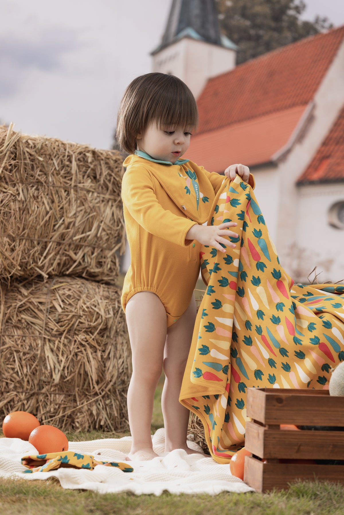 Vauva FW23 - Baby Boy Carrot Pattern Cotton Polo Long Sleeve Bodysuit (Yellow) model side