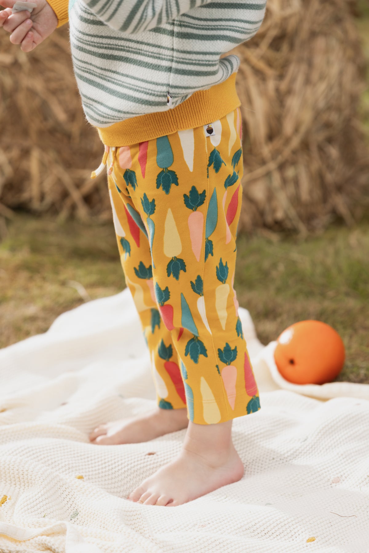 Vauva FW23 - Baby Boy Carrot All Over Print Cotton Pants (Yellow) model front -2 