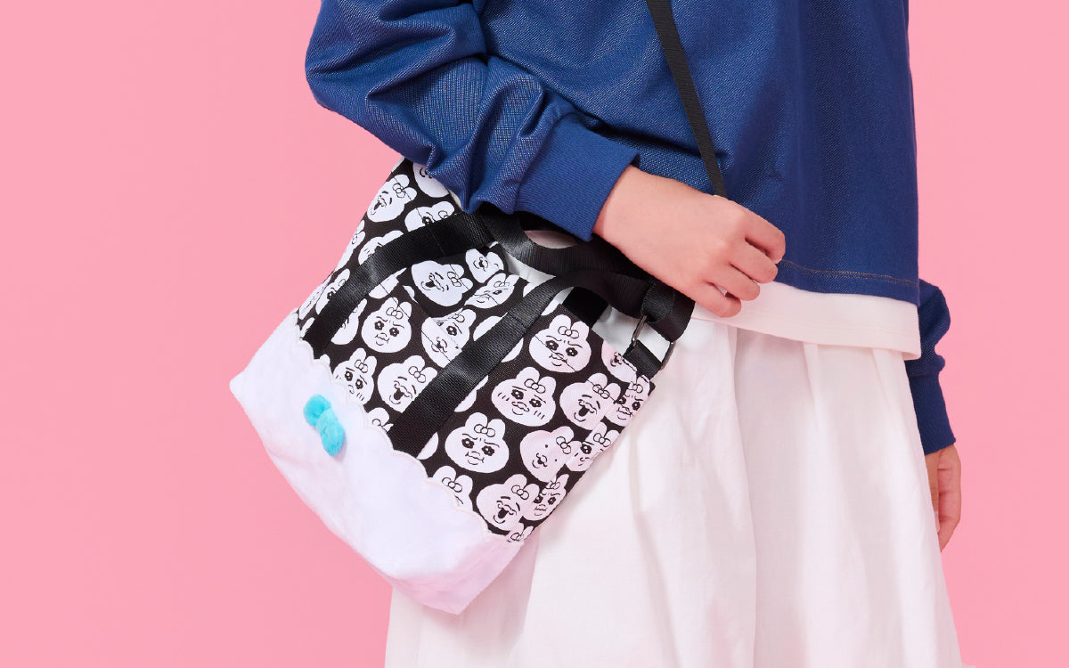 Playful Opanchu Usagi prints meet bold black-and-white designs, creating stylish accessories with a fresh, gender-neutral look. Reversible bucket hats add even more styling possibilities. 