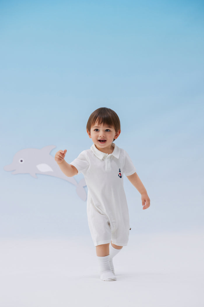 Vauva SS24 - Baby Boy Polo White Shortie Romper model image