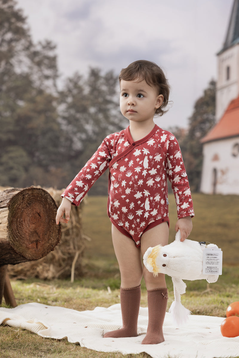 Vauva x Moomin FW23 - Baby Girls Moomin All Over Print Cotton Long Sleeve Bodysuit (Red) model front