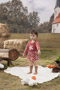 Vauva x Moomin FW23 - Baby Girls Cotton Long Sleeve Bodysuit (Red) model front