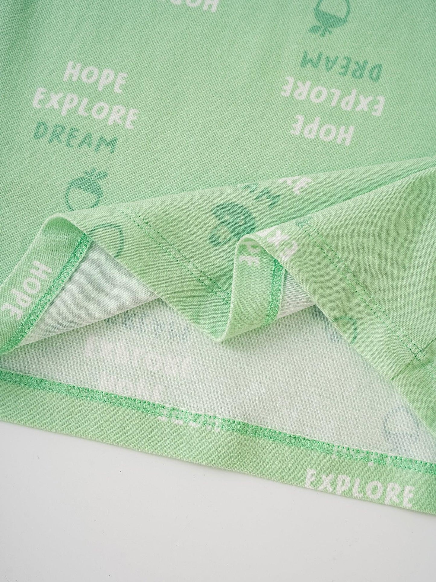 Kids Short Sleeve All‑Over “Hope Explore Dream” Print Tee