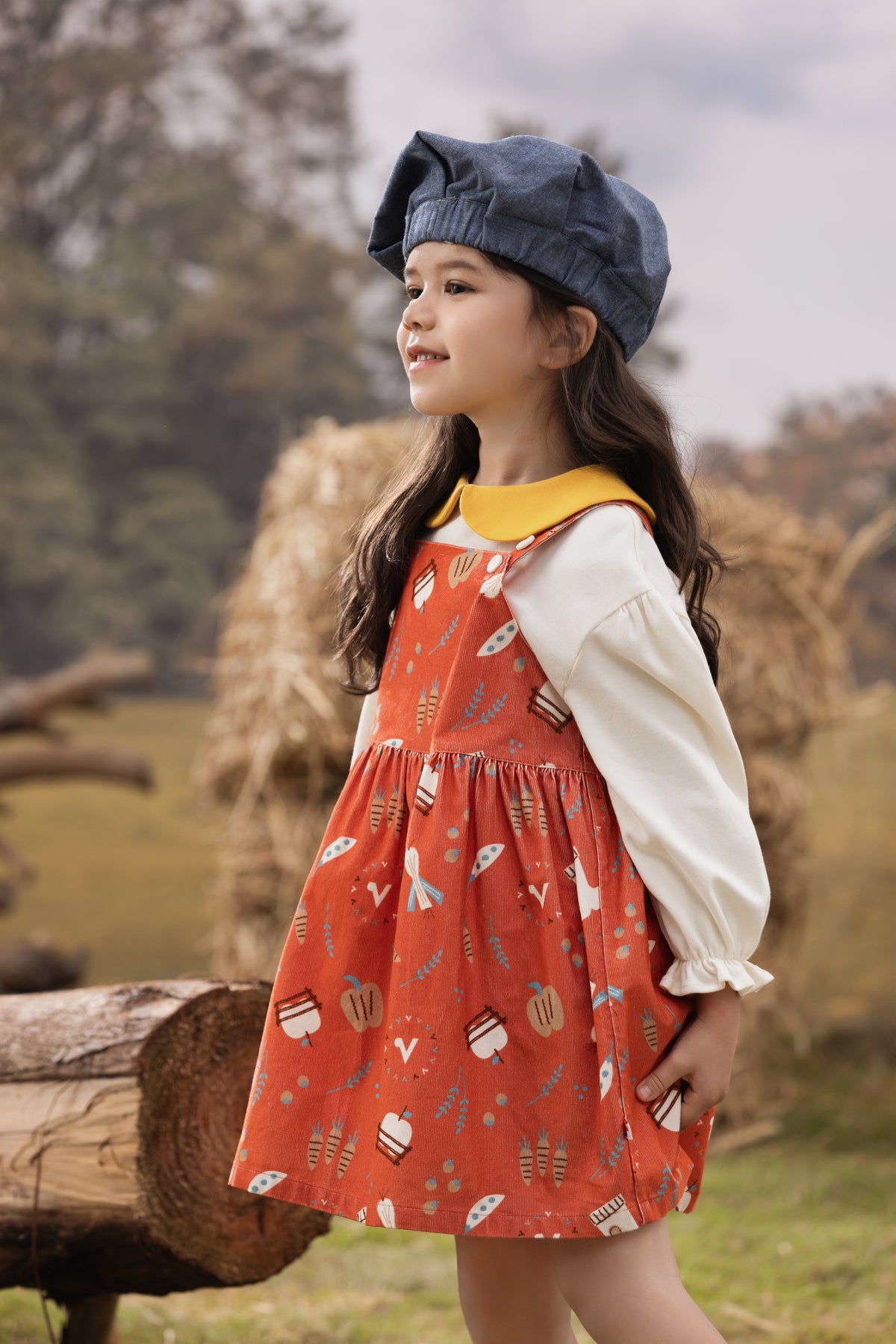 Vauva FW23 - Girls Happy Farm Cotton Dress (Red) model side