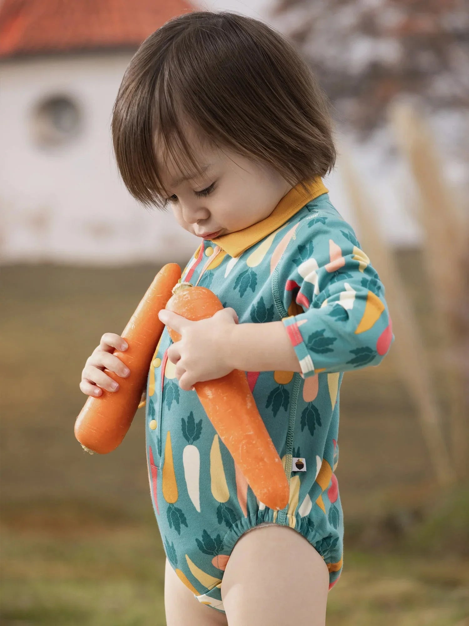 VAUVA Vauva FW23 - Baby Boy Carrot All Over Print Cotton Polo Long Sleeve Bodysuit (Green) Bodysuit