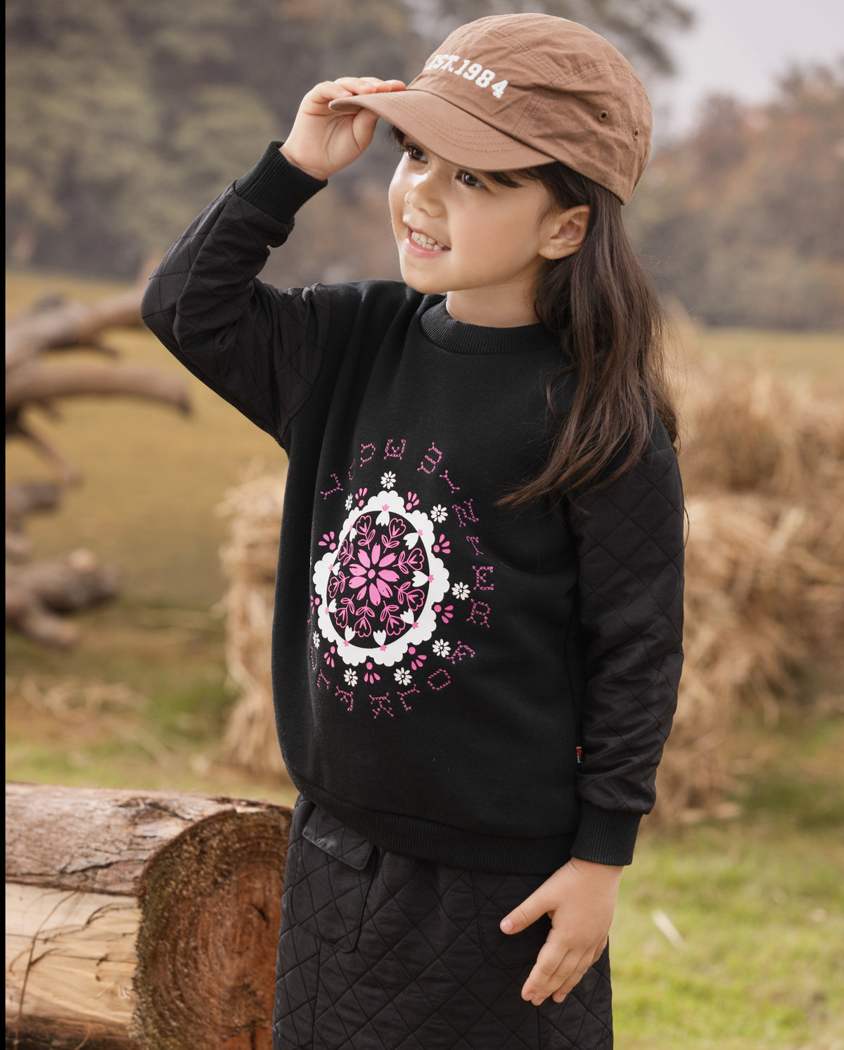 Vauva FW23 - Girls Organic Cotton Sweater (Black) model front 