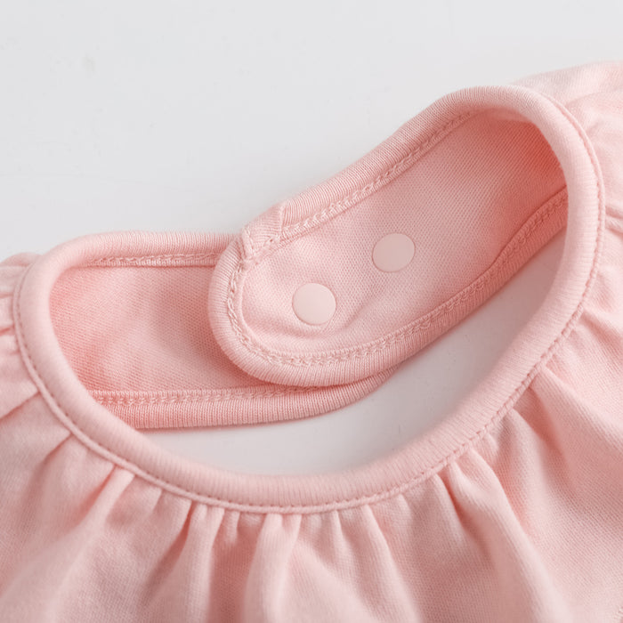 Vauva FW23 - Baby Girls Pinwheel All Over Print Ruffle Cotton Bib (Pink)