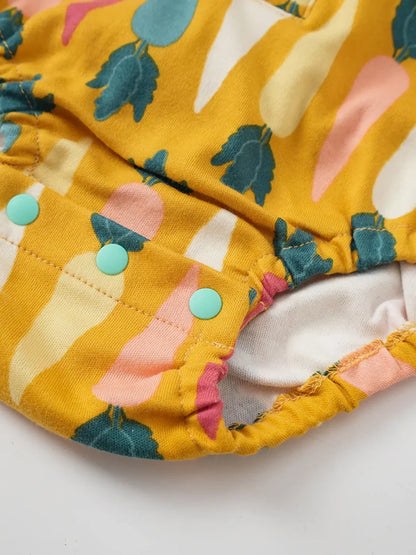VAUVA Vauva FW23 - Baby Boy Carrot All Over Print Cotton Polo Long Sleeve Bodysuit (Yellow) Bodysuit
